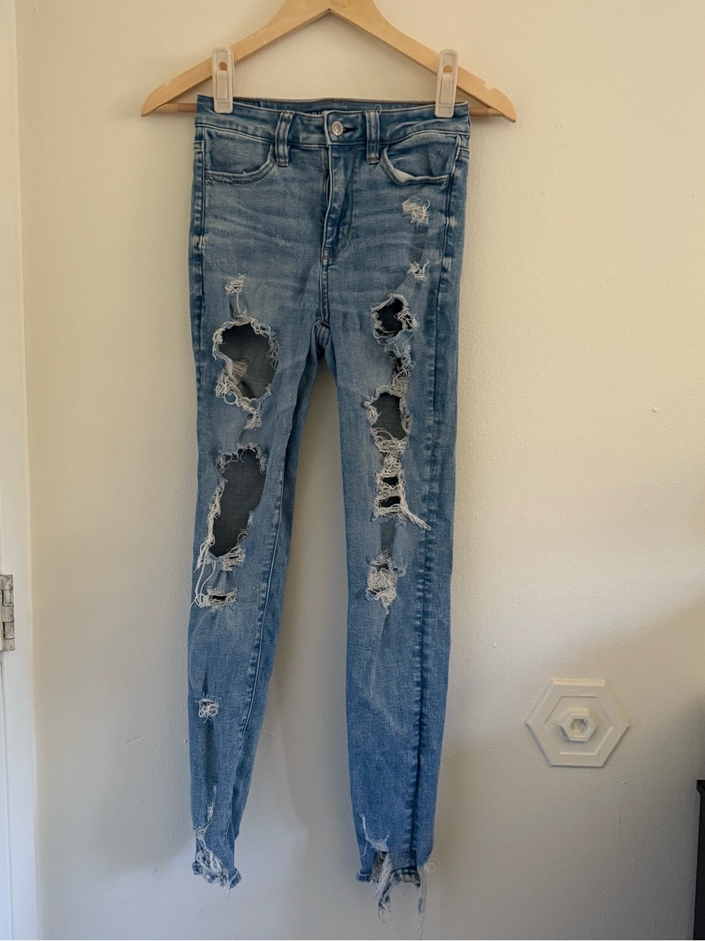 American Eagle OutfittersSuper Hi Rise Jegging Light Blue Ripped Skinny Jeans